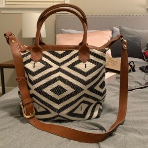 Blue and white patterned bag with strap